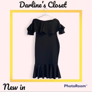 Black mermaid off shoulders dress.